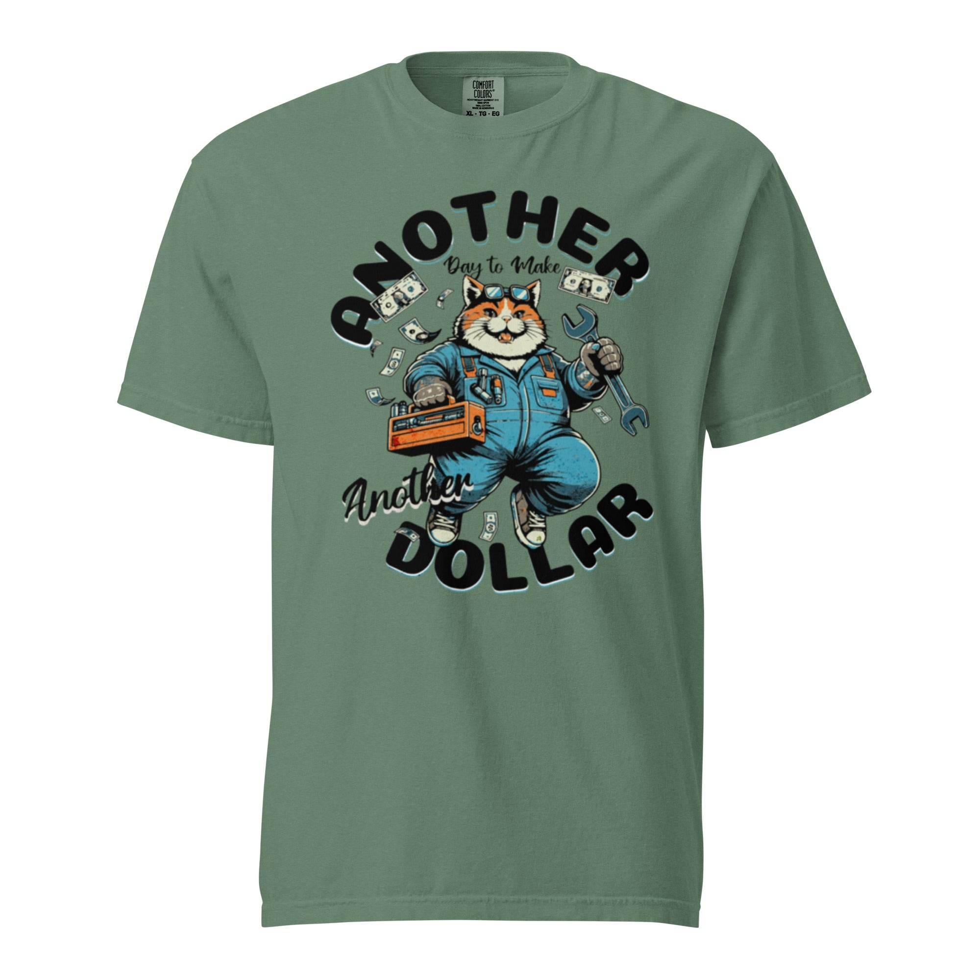 Light-green garment-dyed heavyweight t-shirt with retro cartoon workwear design – vintage-inspired bold graphic, titled Another Dollar. - Annaise Store