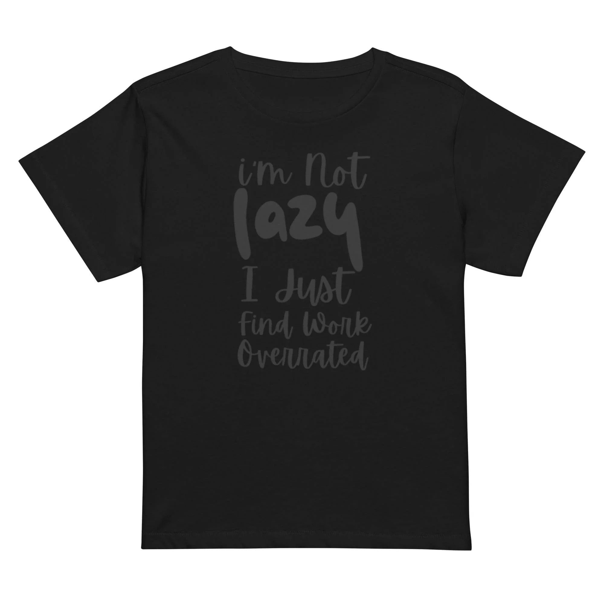 Woman wearing a black cropped graphic t-shirt with the phrase ‘I’m Not Lazy, I Just Need More Energy,’ paired with cream pants — part of the Cropped & Chic Tops collection. - Annaise Store