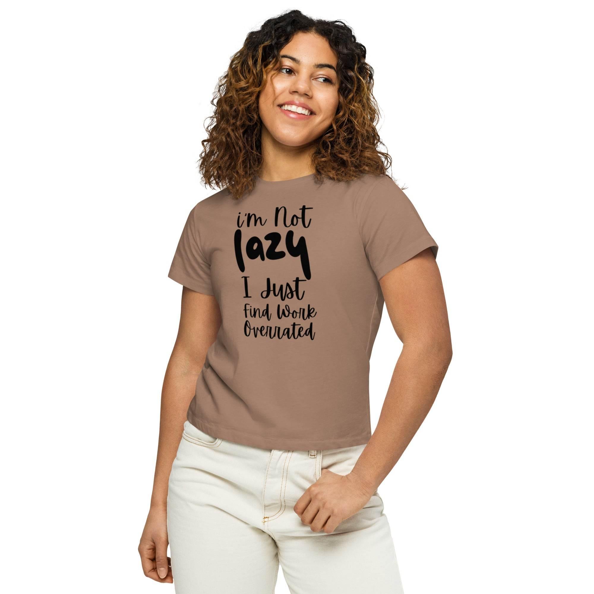 Woman wearing a latte cropped graphic t-shirt with the phrase ‘I’m Not Lazy, I Just Need More Energy,’ paired with cream pants — part of the Cropped & Chic Tops collection. - Annaise Store