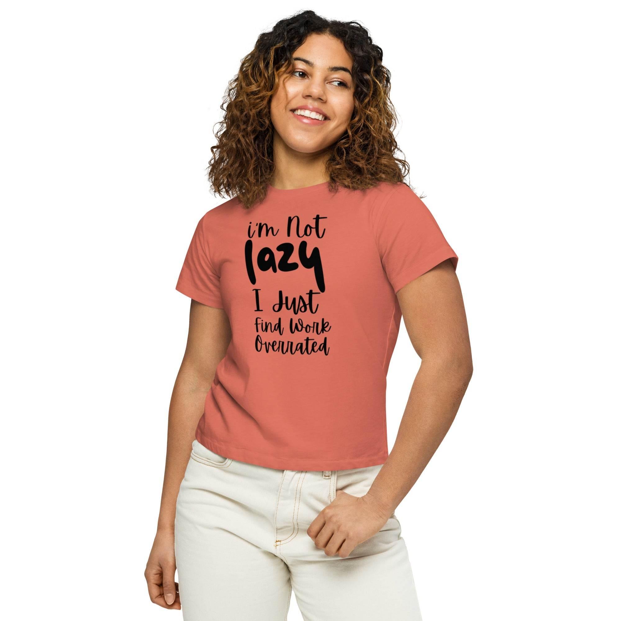 Woman wearing a red-sorbet cropped graphic t-shirt with the phrase ‘I’m Not Lazy, I Just Need More Energy,’ paired with cream pants — part of the Cropped & Chic Tops collection.- Annaise Store